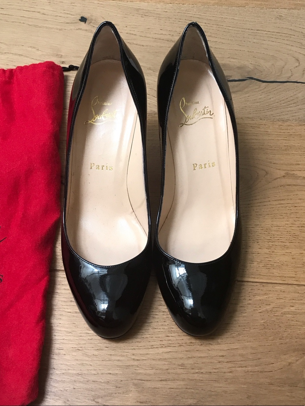 Christian Louboutin Black Patent Leather Round-Toe Pumps